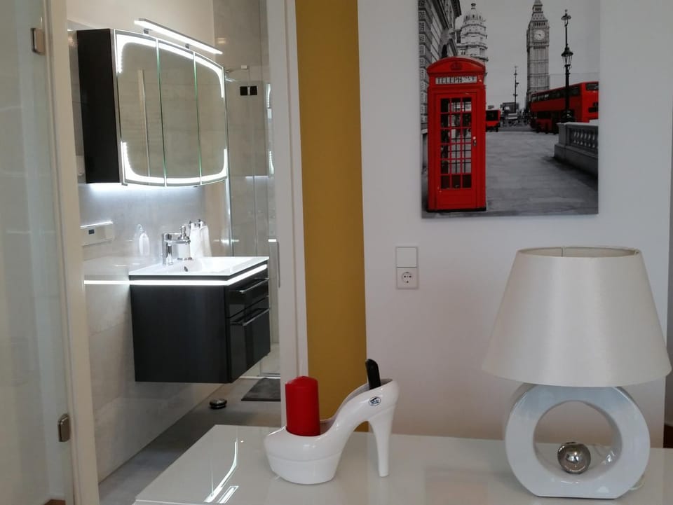 Shower, Toilet, Property logo or sign, Bathroom