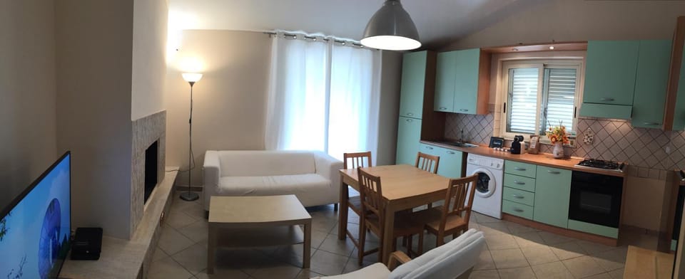 Kitchen or kitchenette, Living room, Seating area, Dining area