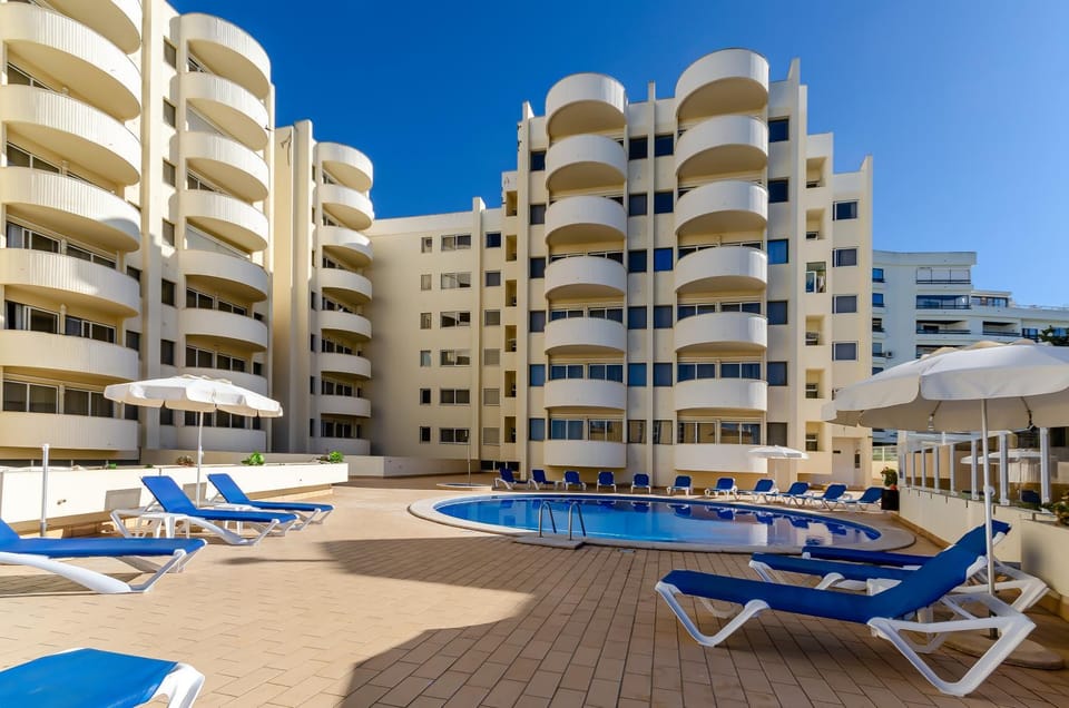 Property building, Swimming pool, sunbed