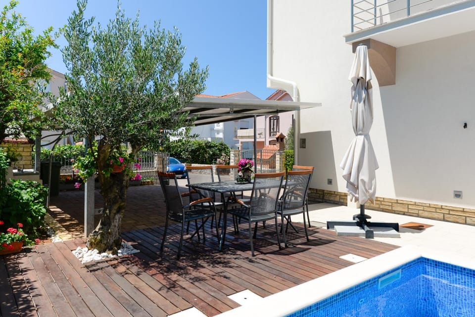 Property building, Patio, Day, Swimming pool