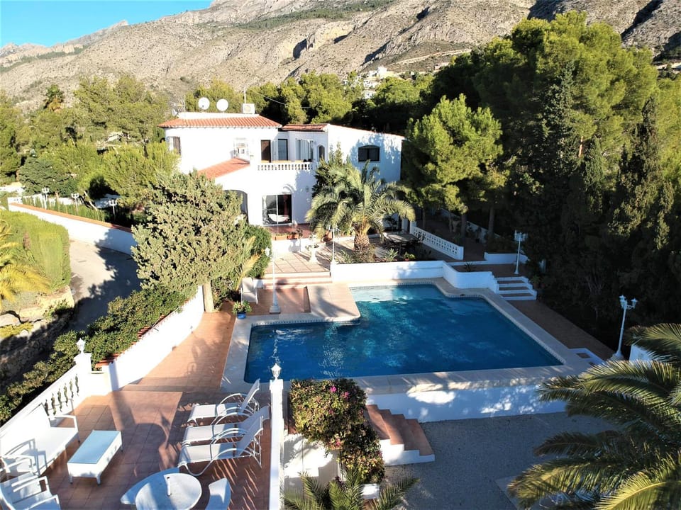 Property building, Natural landscape, Mountain view, Pool view, Swimming pool, sunbed