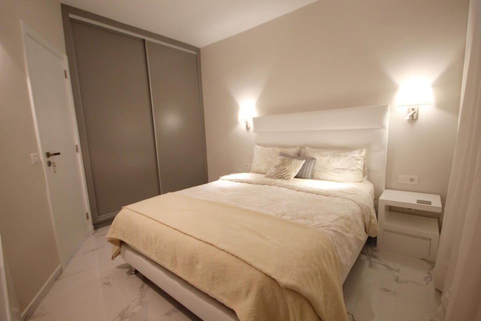 Bed, wardrobe