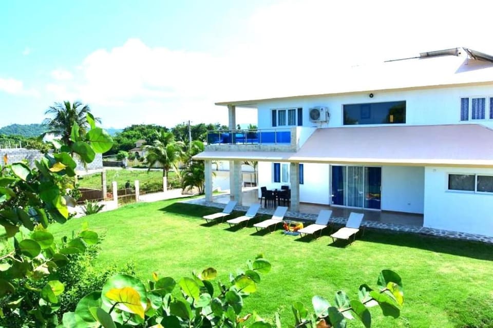 Property building, Patio, Natural landscape, Garden, View (from property/room), Balcony/Terrace, Garden view, sunbed