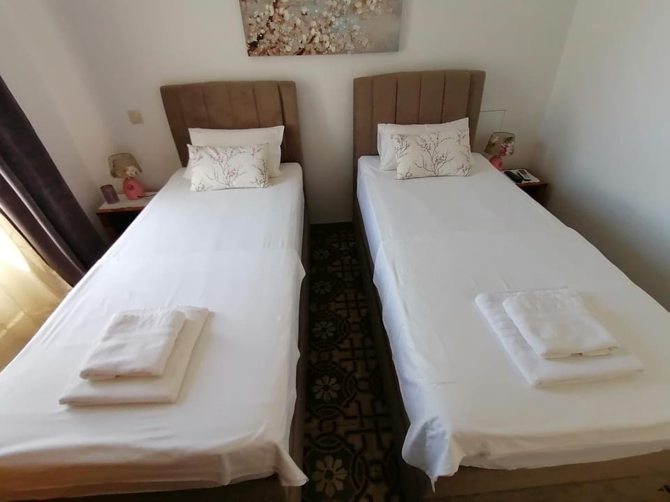 Bed, Balcony/Terrace, Bedroom, towels, air conditioner