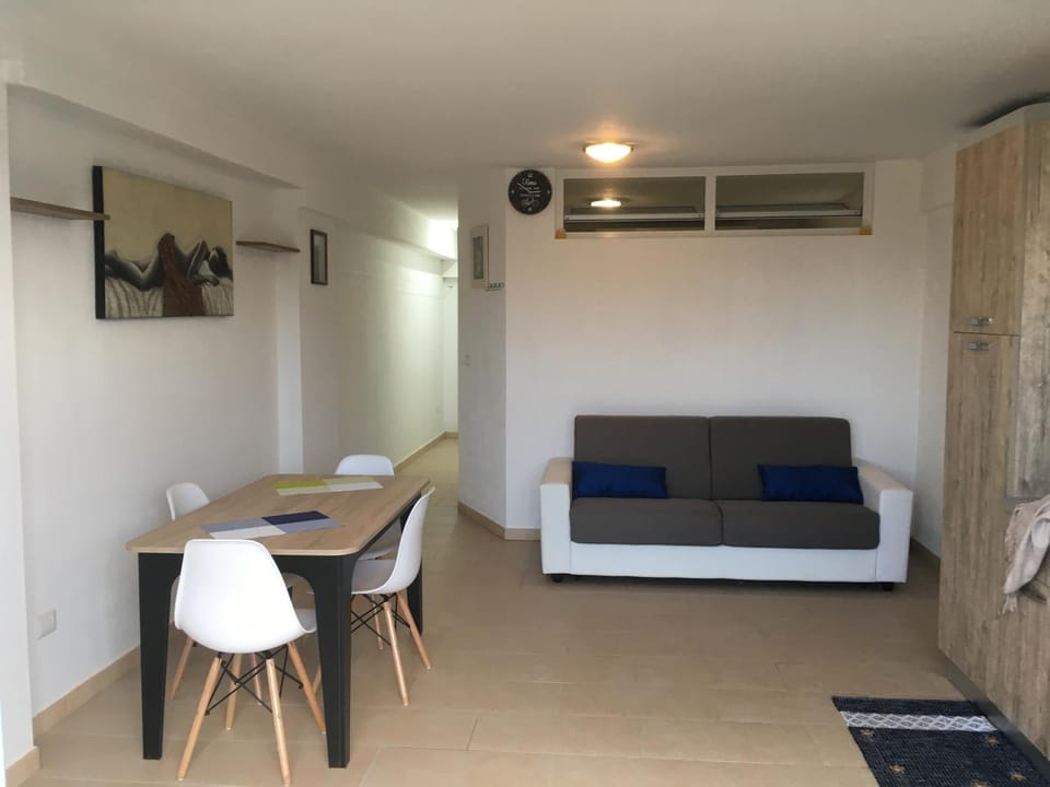 Property building, Living room, Seating area, Dining area