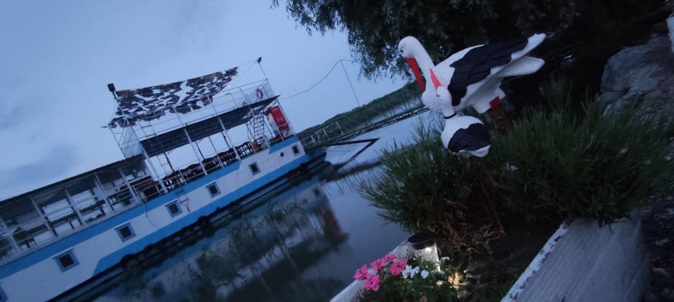 Pontonul lui Cristian Docked boat in Romania
