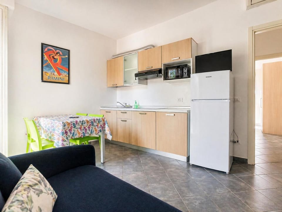 Kitchen or kitchenette, Living room, Seating area, stove