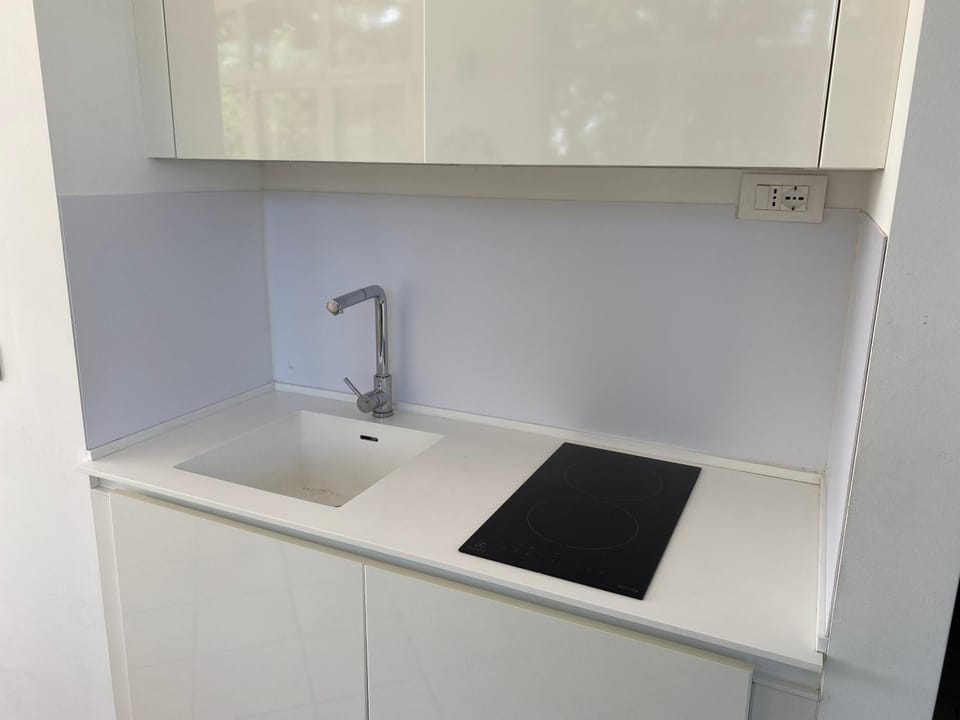 Kitchen or kitchenette, stove, kitchen