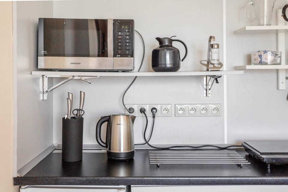 People, Coffee/tea facilities, View (from property/room), Kitchen or kitchenette, Food and drinks, Decorative detail, Communal kitchen, Food, Area and facilities, Area and facilities, Drinks