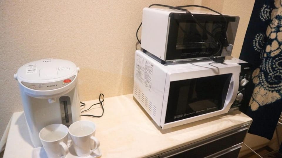 Kitchen or kitchenette, microwave, toaster