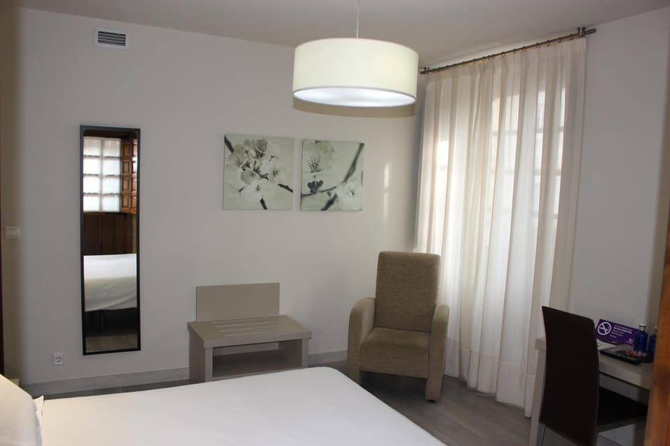 Bed, Seating area, Bedroom