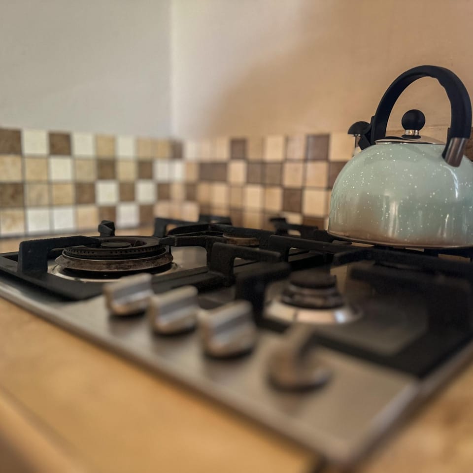 Kitchen or kitchenette, stove