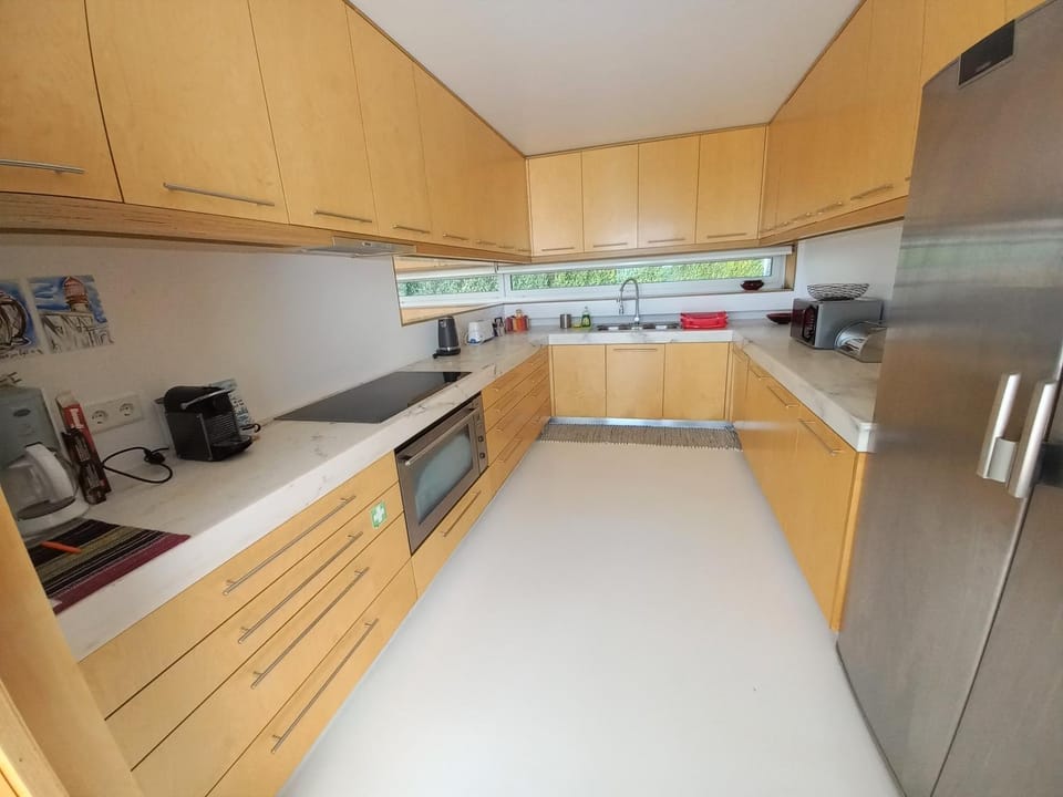 Kitchen or kitchenette, dishwasher, oven, stove, toaster
