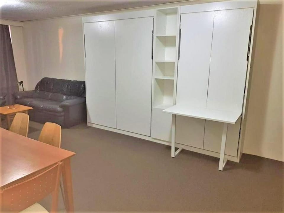Bed, Living room, Seating area, Dining area