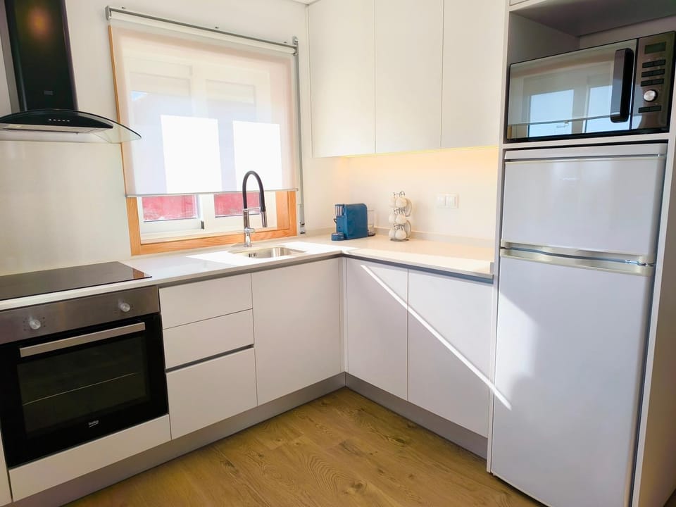 Kitchen or kitchenette, oven, stove