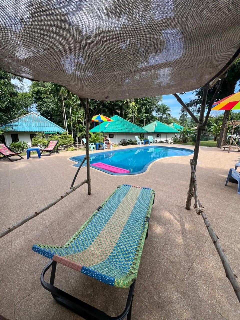 Swimming pool, sunbed