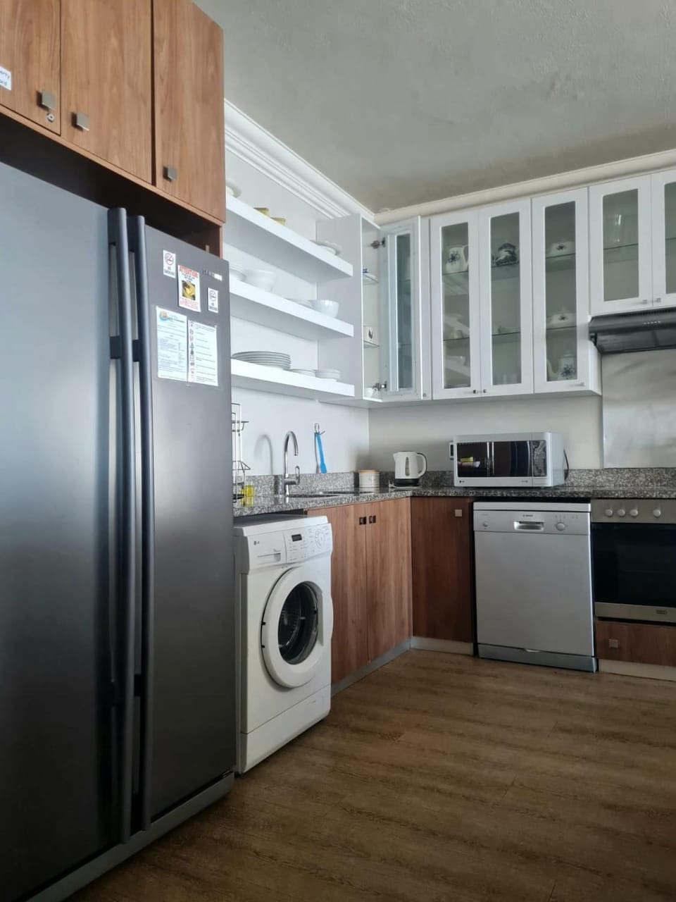 Kitchen or kitchenette, dishwasher, microwave