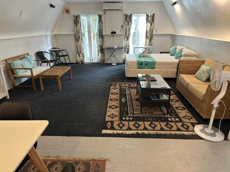 Bed, Living room, Seating area, Bedroom