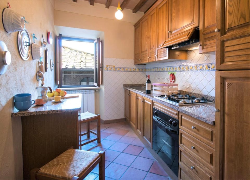 Kitchen or kitchenette, oven, stove