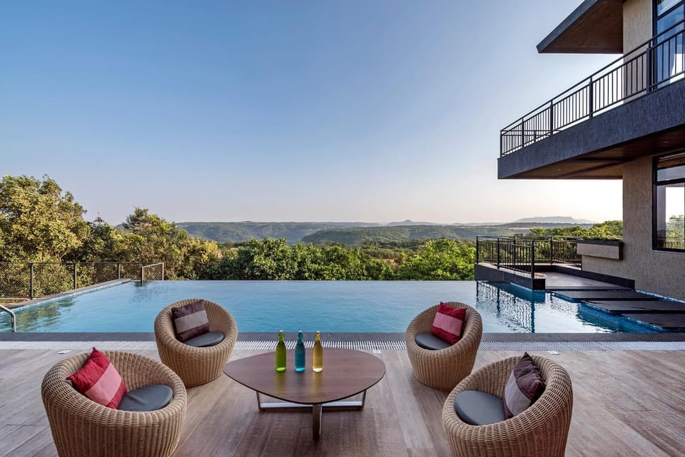 View (from property/room), Seating area, Mountain view, Pool view, Swimming pool, Swimming pool