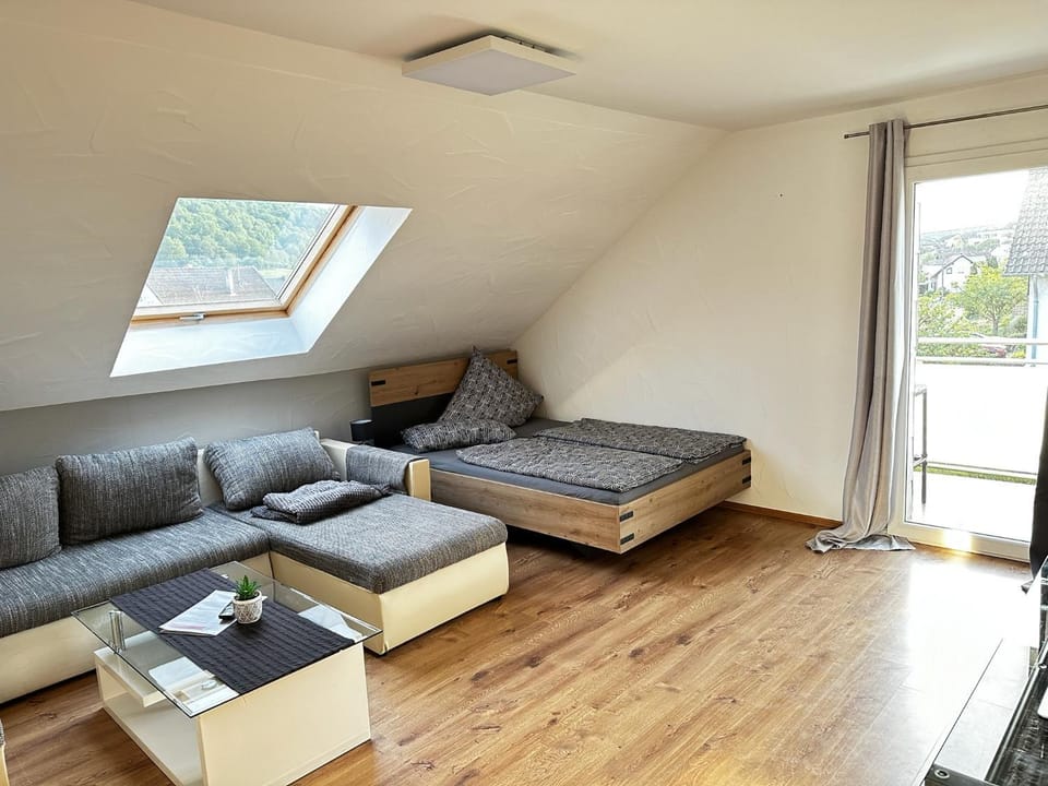 Bed, TV and multimedia, Living room, Seating area