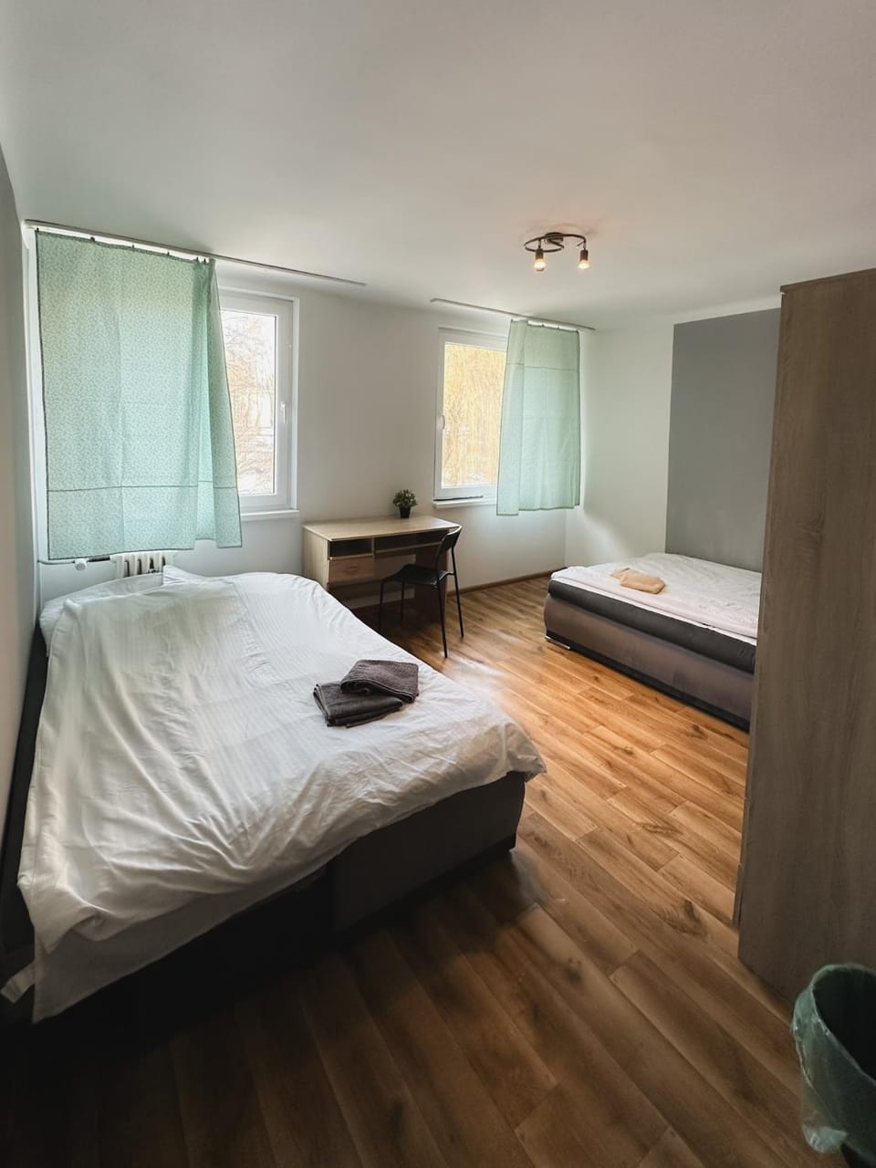 Bed, Photo of the whole room, towels, wardrobe