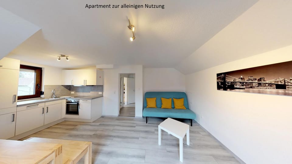 Kitchen or kitchenette, Living room, Seating area, Dining area