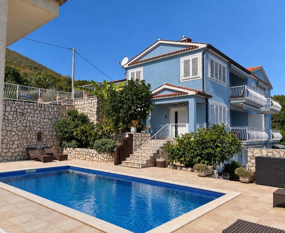 Property building, Patio, Day, Pool view, Swimming pool