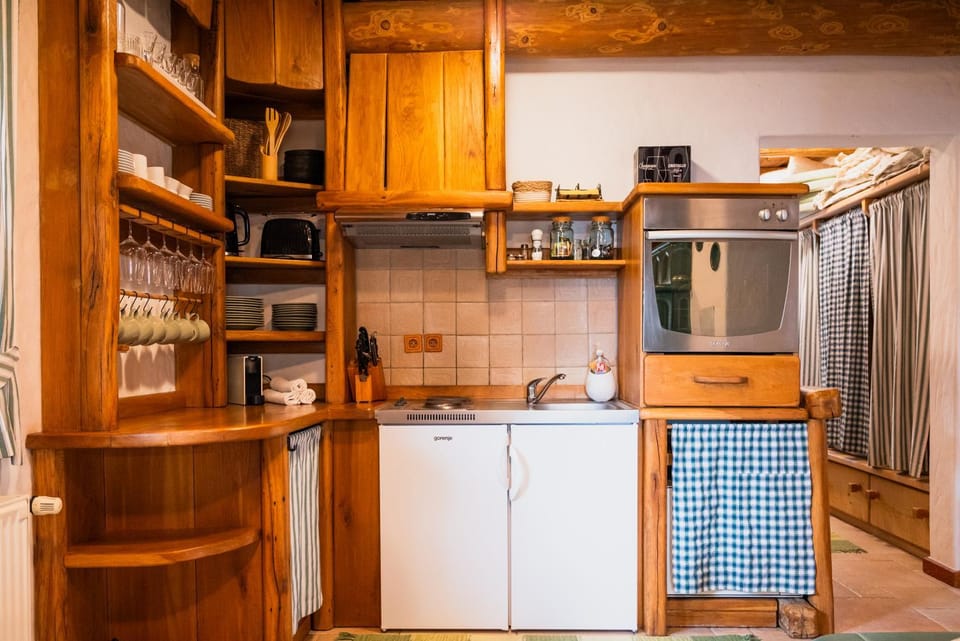 Kitchen or kitchenette, stove, kitchen