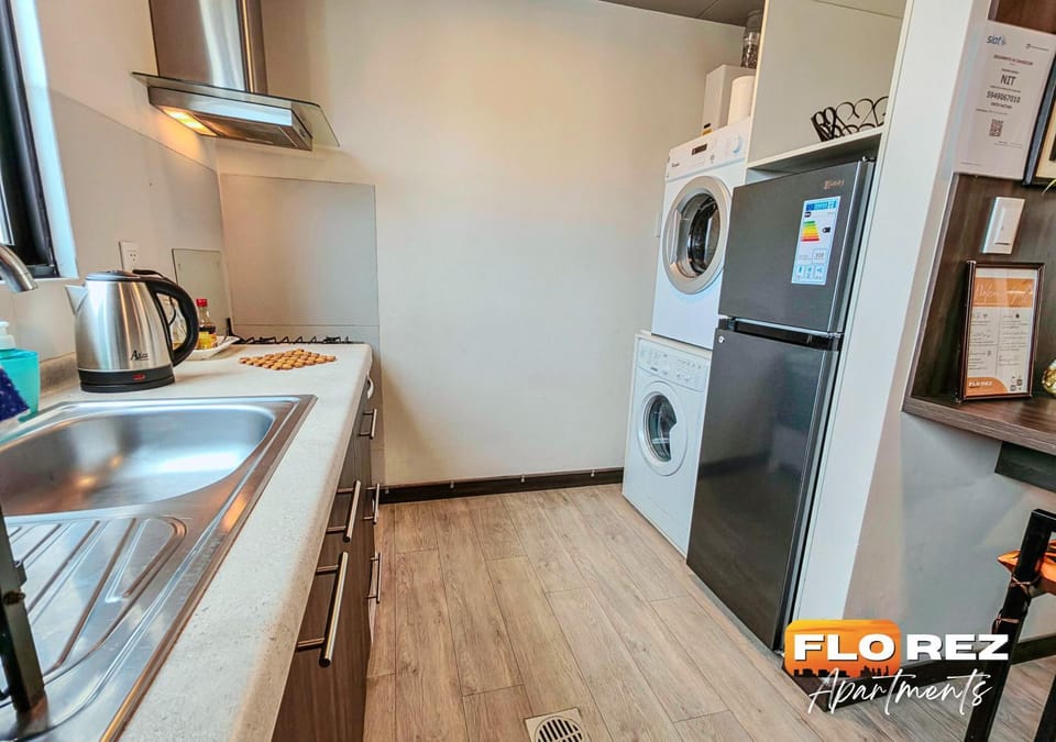 Kitchen or kitchenette, washing machine, dryer