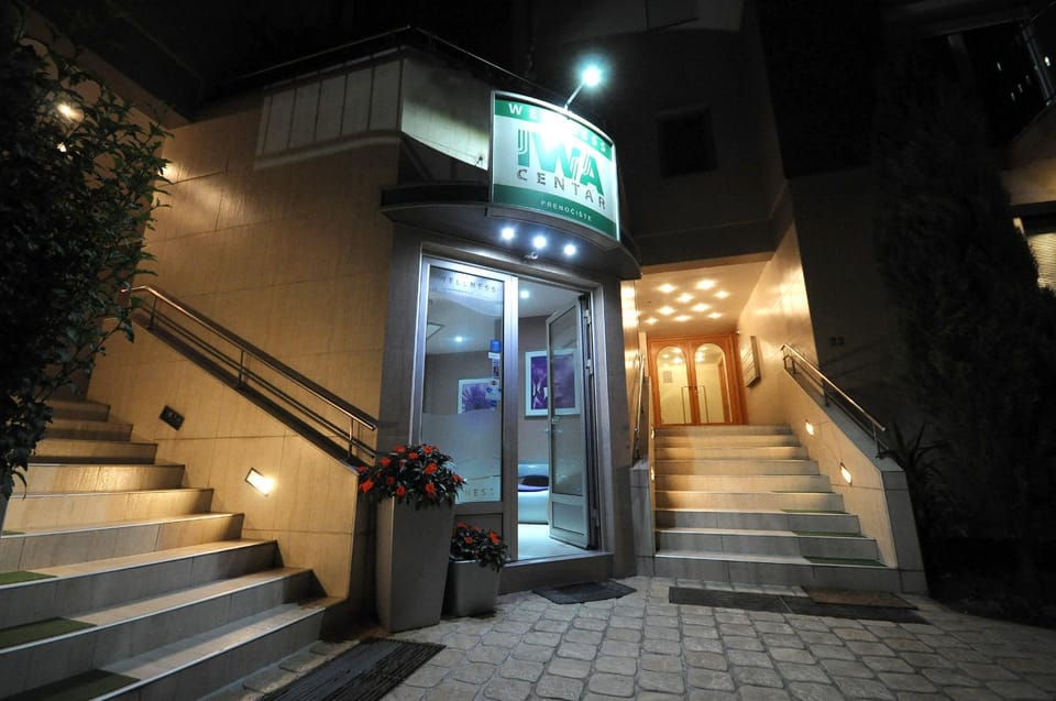 Property building, Facade/entrance, Night, Property logo or sign