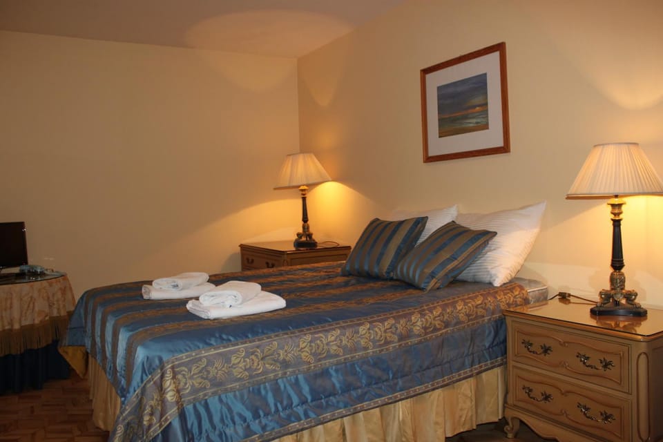 Bed, Photo of the whole room, Decorative detail, Bedroom, towels