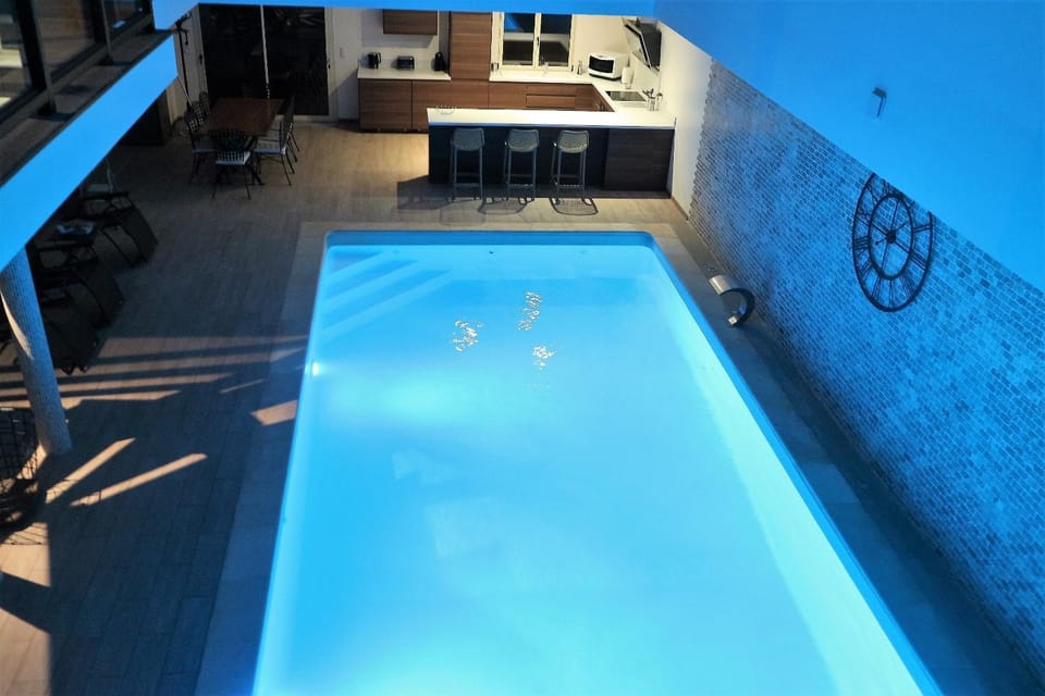 Property building, Night, Coffee/tea facilities, View (from property/room), View (from property/room), Pool view, Swimming pool, dishwasher, oven, stove, sunbed, kitchen, kitchen