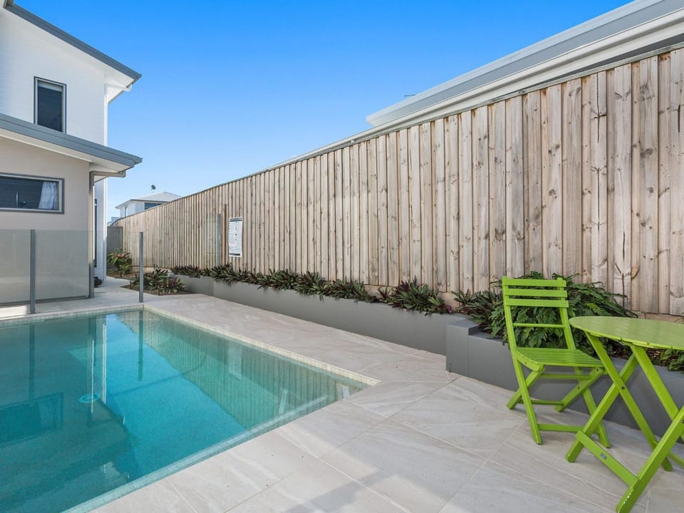 Property building, Patio, Day, Pool view, Swimming pool