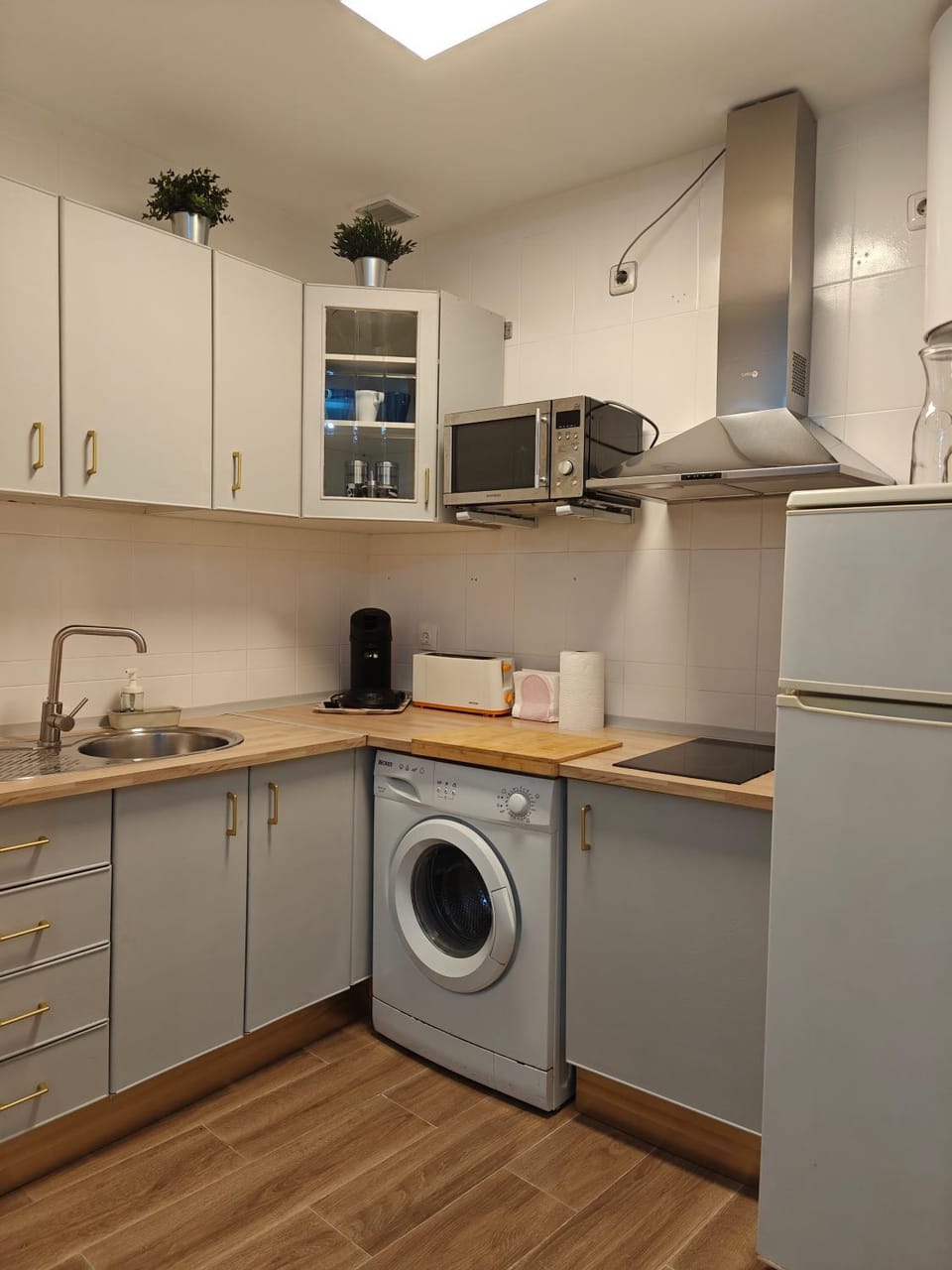 Kitchen or kitchenette, stove, toaster