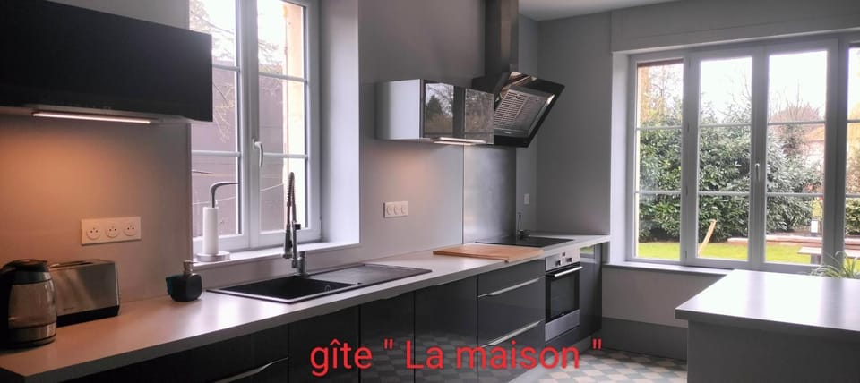 Kitchen or kitchenette, dishwasher, oven, stove
