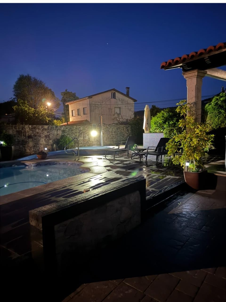 Property building, Patio, Night, Natural landscape, Pool view, Swimming pool, sunbed