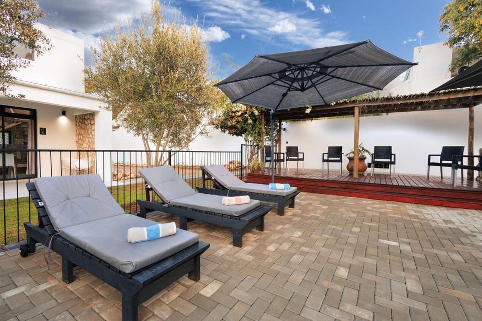 Day, View (from property/room), Seating area, Swimming pool