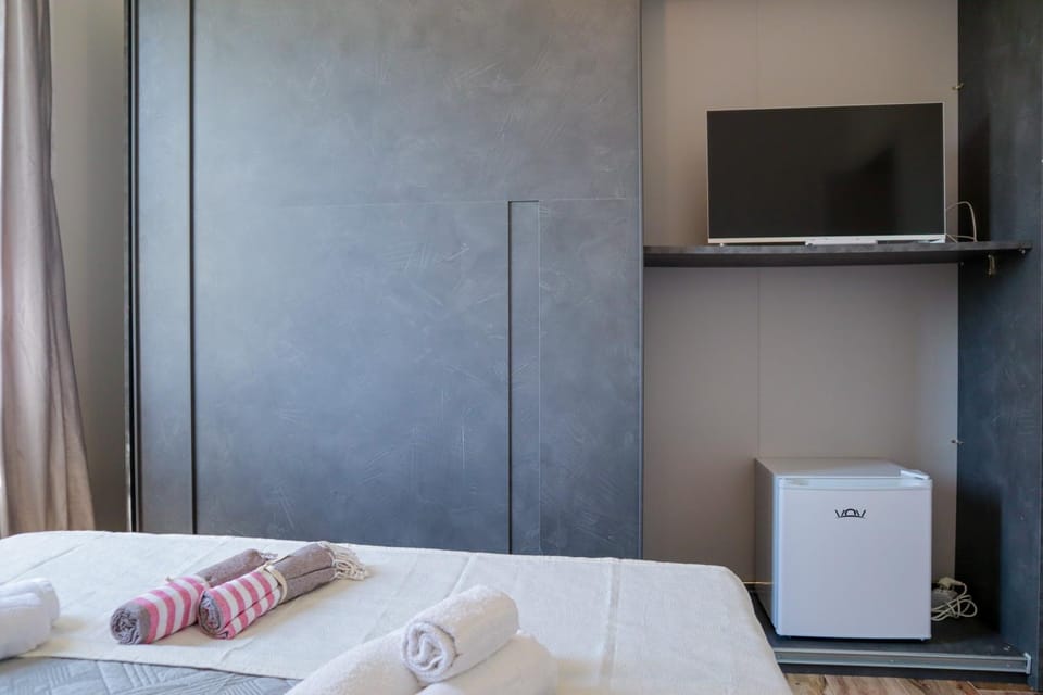 Bed, TV and multimedia, Bedroom, towels, wardrobe, air conditioner