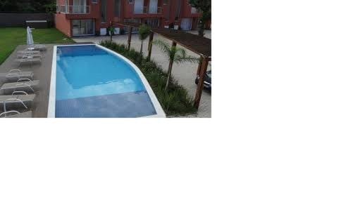Pé na areia em Boiçucanga condominio Aquamarine - perto de Maresias e Camburi Villa in São Sebastião