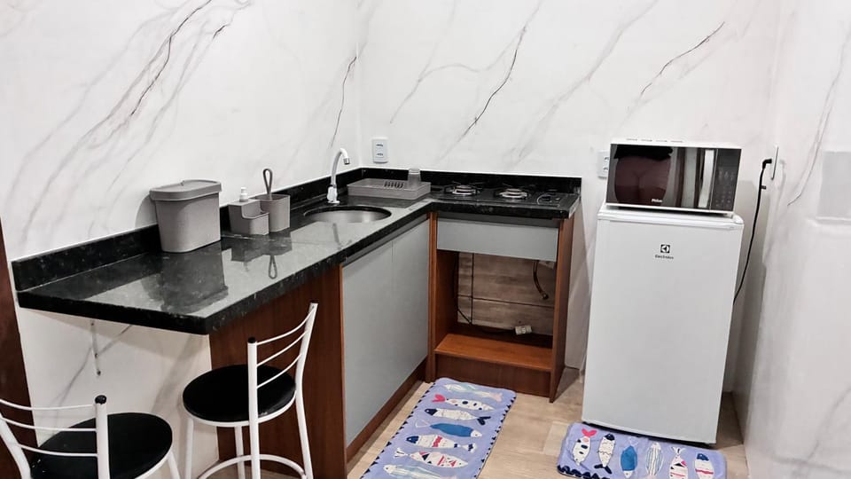 Cantinho da kel 02, apto térreo de um dormitório, cozinha e banheiro, acomoda 3 pessoas Apartment in Bombinhas