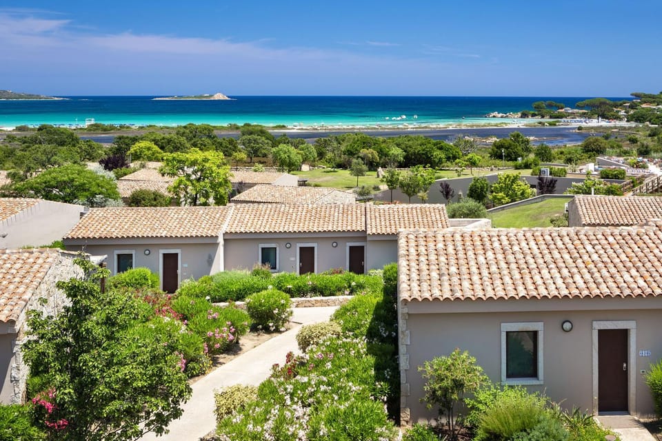 Property building, Nearby landmark, Day, Natural landscape, Beach, Sea view