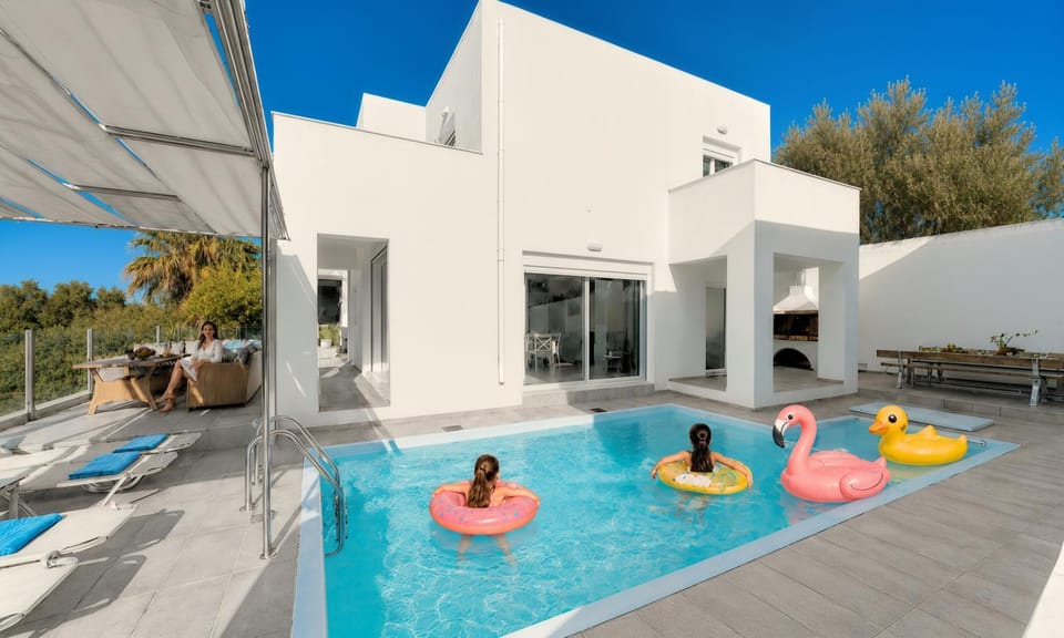 Patio, Day, Natural landscape, Pool view, Swimming pool, sunbed