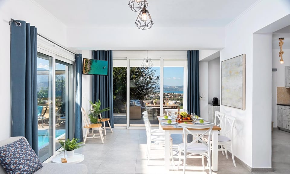 Natural landscape, View (from property/room), Living room, Seating area, Dining area, Sea view