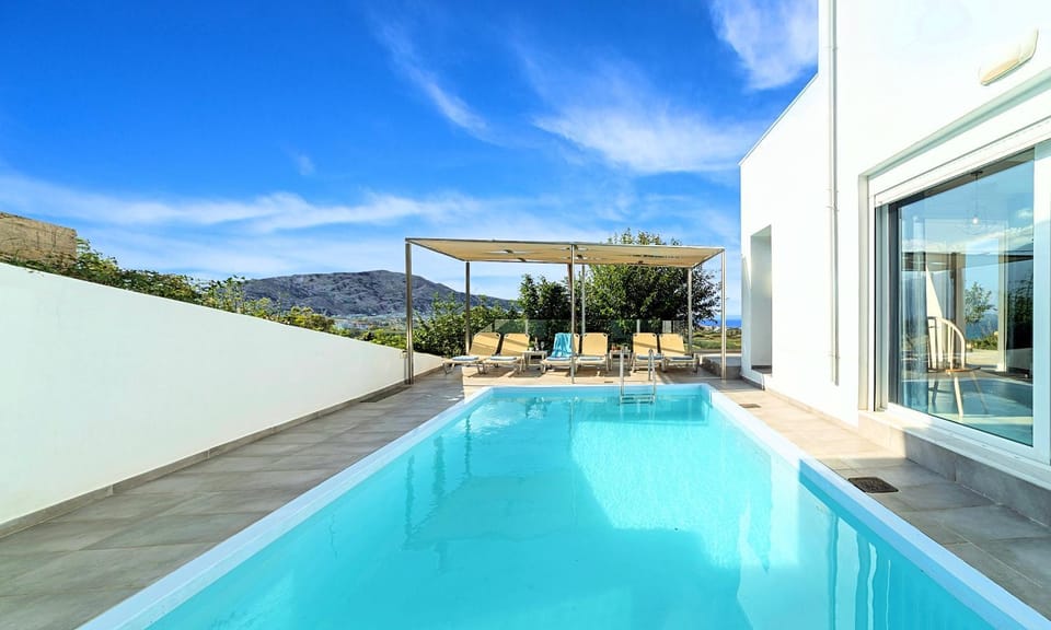 Property building, Natural landscape, Pool view, Swimming pool, sunbed