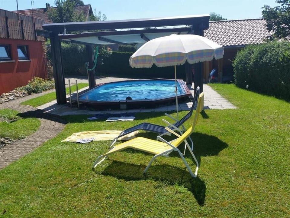 Property building, Living room, Swimming pool