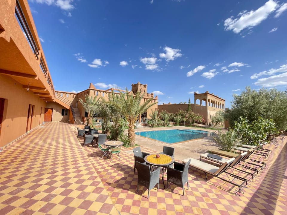 Property building, Patio, Natural landscape, Pool view, Swimming pool
