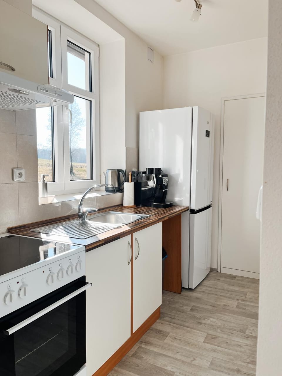 Kitchen or kitchenette, oven
