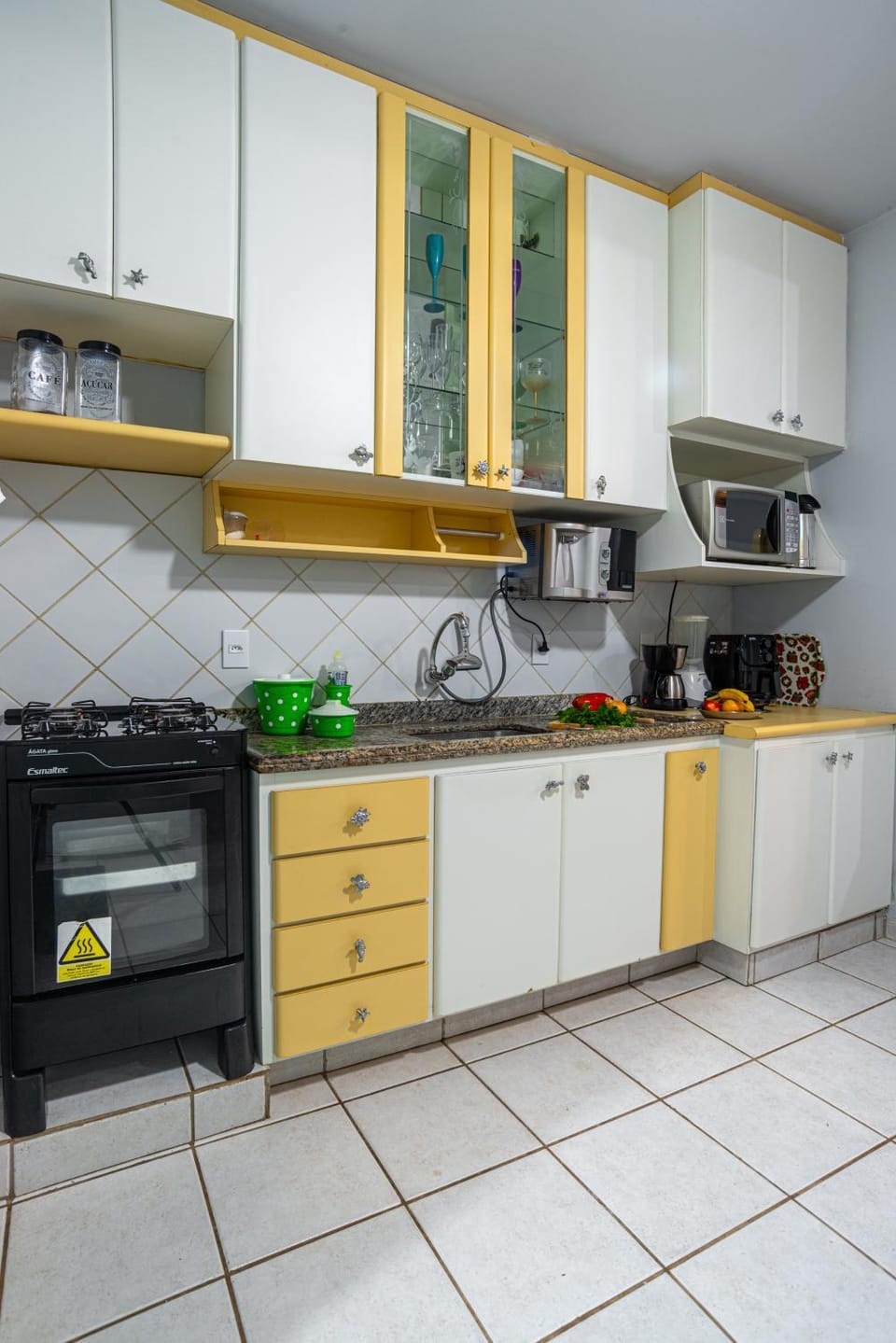 Kitchen or kitchenette, stove, toaster