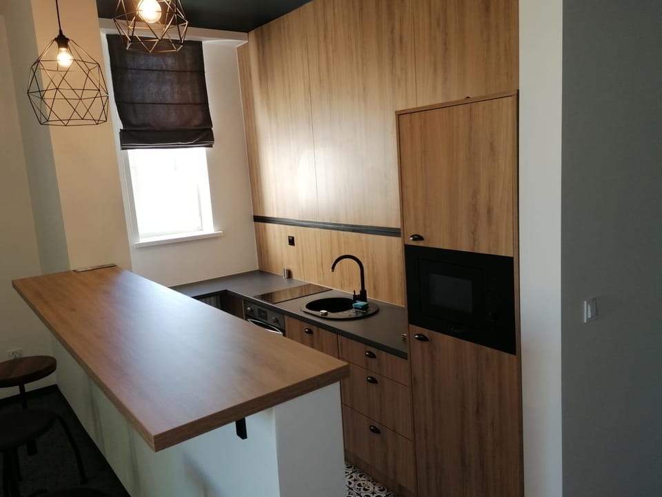 Kitchen or kitchenette, oven, stove